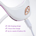 The LED Electric Eye Massager with the devices charging cord pluged in. Content stating 