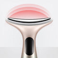 The EMS Neck Face Firming Massager with a red glow radiating from the end.